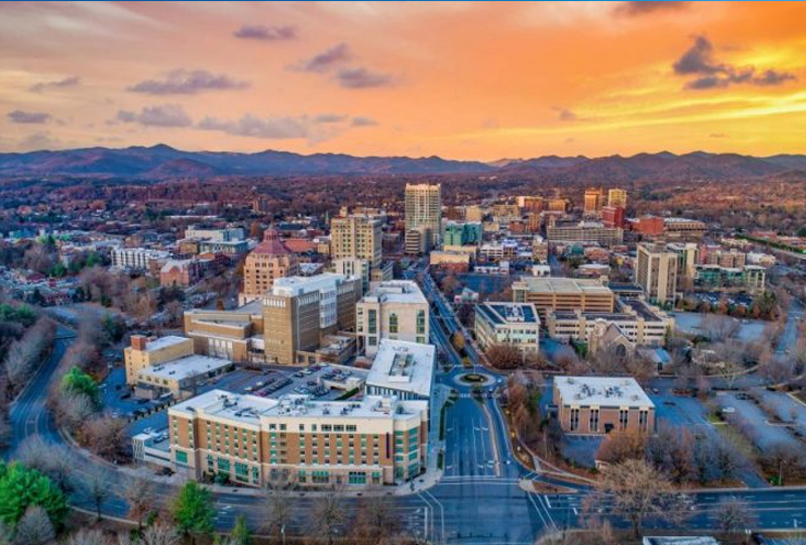 Asheville, North Carolina city skyline at sunset